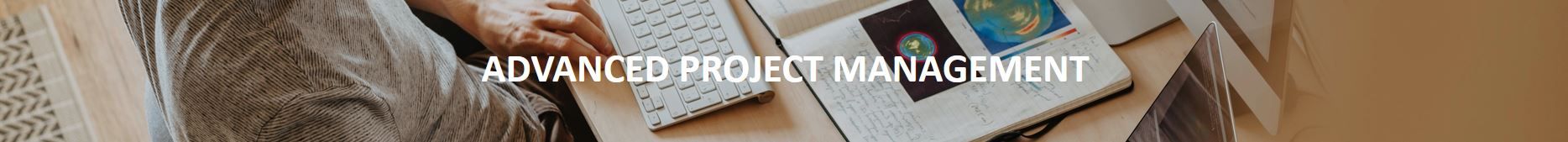 Banner image displaying the text “Advanced Project Management” in bold white letters. The background shows a person working at a desk with a wireless keyboard and an open notebook containing handwritten notes and colorful diagrams, evoking a focused and professional atmosphere.
