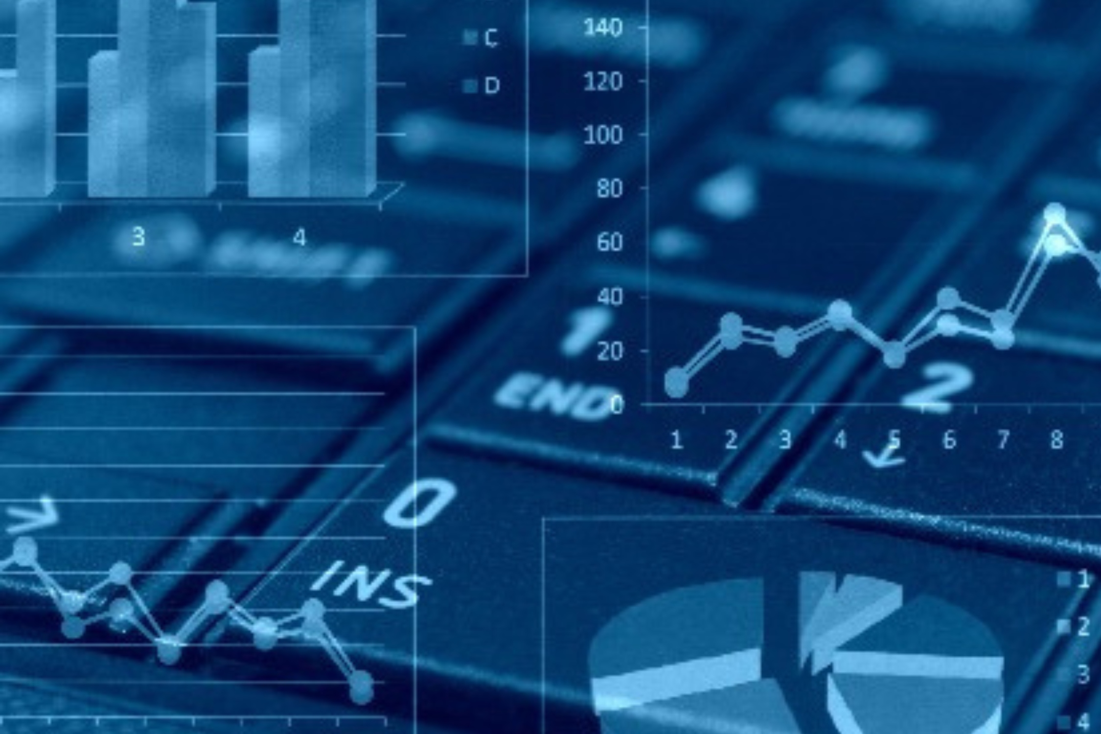 graphs overlaying a computer keyboard