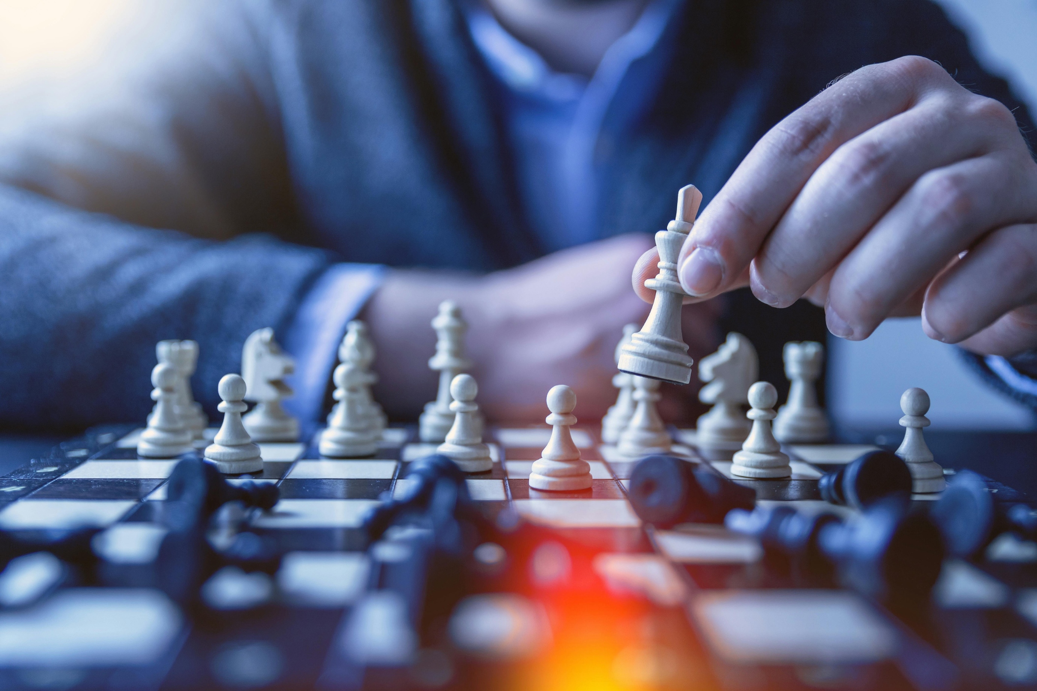 person playing chess close up