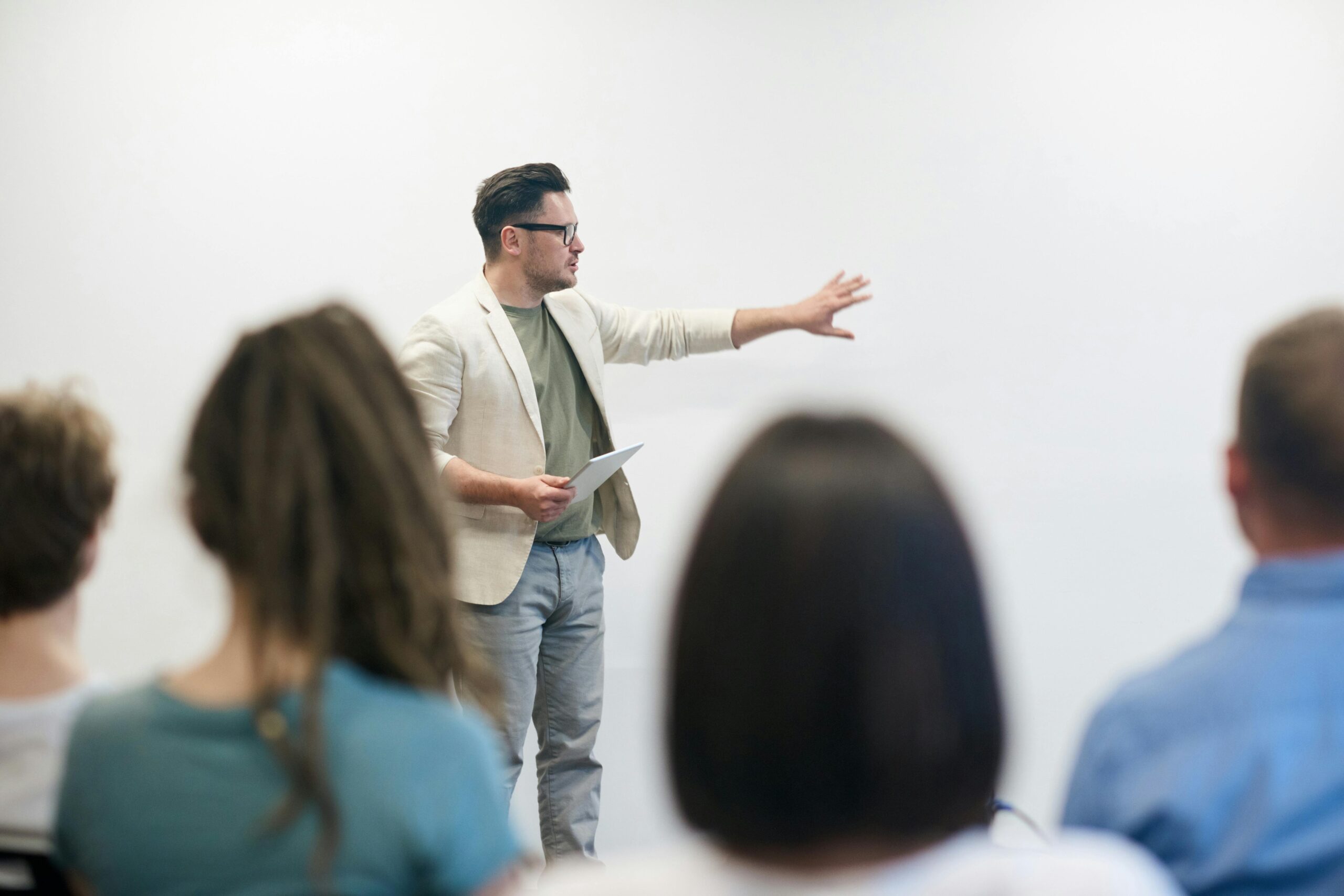 Man presenting in front of class