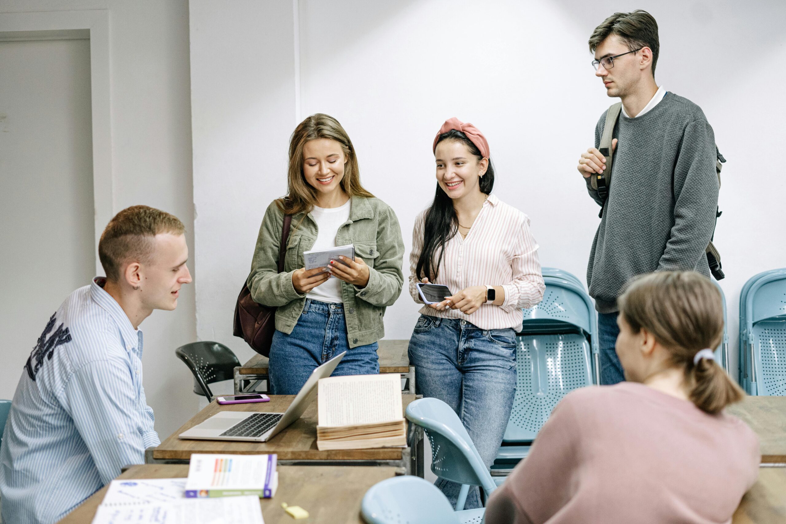 students talking casually in classroom