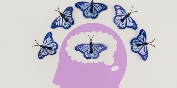 head with butterflies surrounding